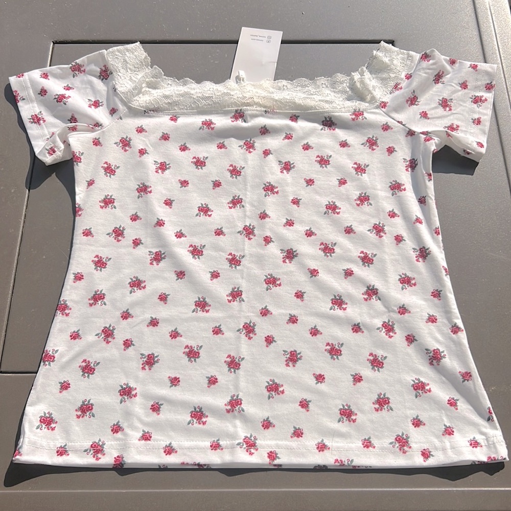 White flowered top